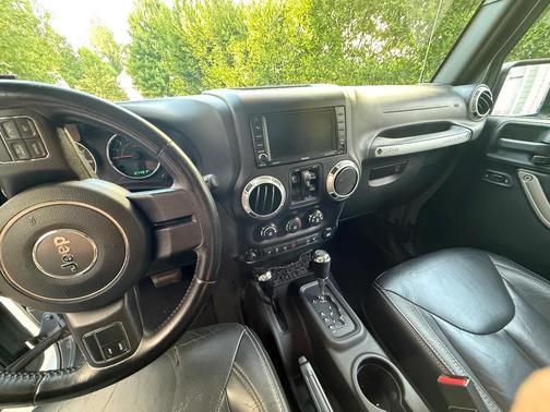 Gray 2015 Jeep Wrangler Unlimited Sahara