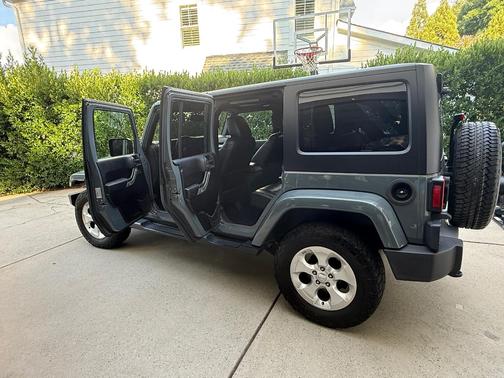 Gray 2015 Jeep Wrangler Unlimited Sahara