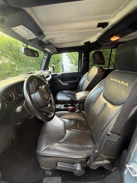 Gray 2015 Jeep Wrangler Unlimited Sahara