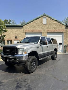 Silver 2004 Ford Excursion XLT