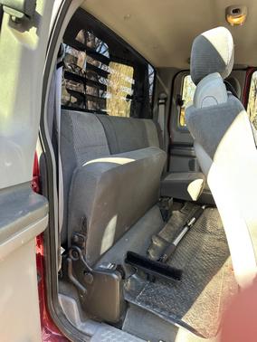 Red 2003 Ford F-250 XLT SuperCab Super Duty