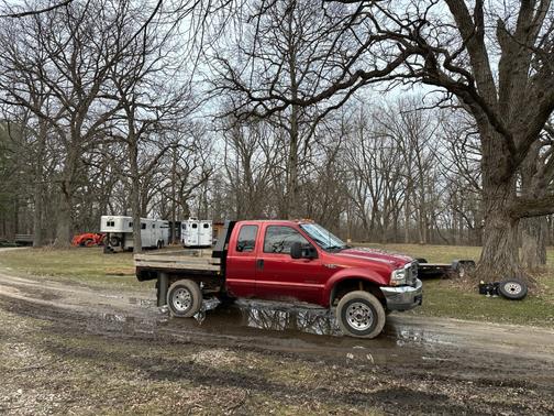 Red 2003 Ford F-250 XLT SuperCab Super Duty