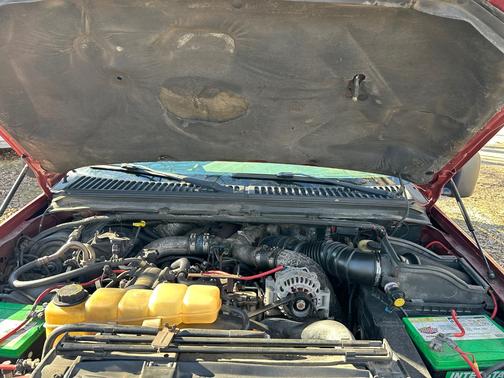 Red 2003 Ford F-250 XLT SuperCab Super Duty