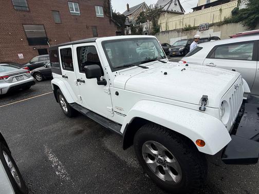 White 2013 Jeep Wrangler Unlimited Sahara