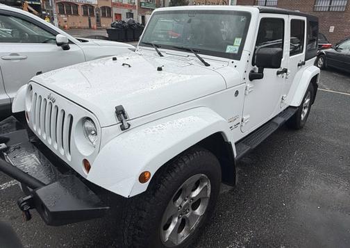 White 2013 Jeep Wrangler Unlimited Sahara