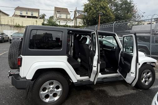 White 2013 Jeep Wrangler Unlimited Sahara