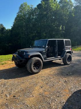 Gray 2017 Jeep Wrangler Unlimited Sport