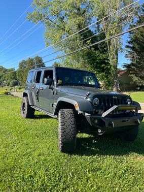 Gray 2017 Jeep Wrangler Unlimited Sport