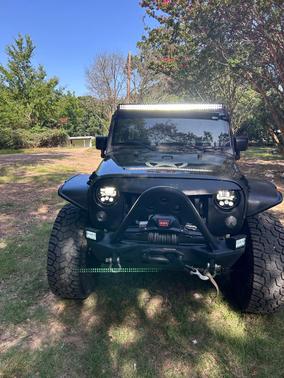 Green 2015 Jeep Wrangler Unlimited Sport