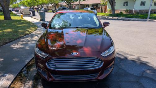 Red 2015 Ford Fusion SE