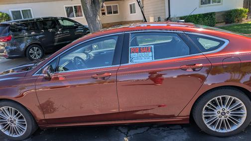 Red 2015 Ford Fusion SE