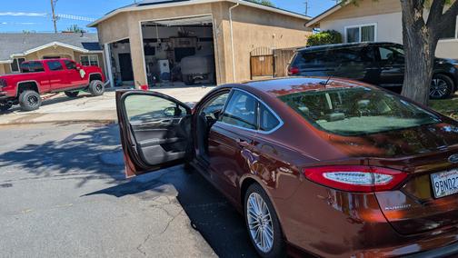 Red 2015 Ford Fusion SE