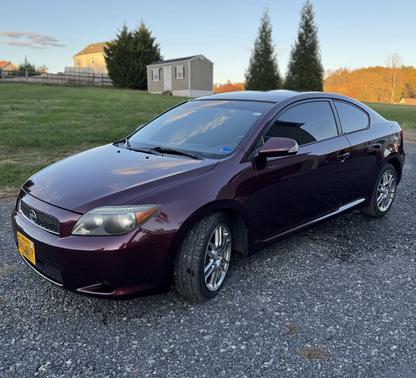 Red 2007 Scion tC Base