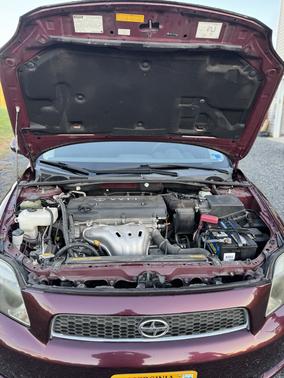 Red 2007 Scion tC Base