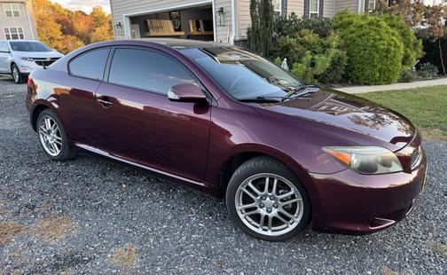 Red 2007 Scion tC Base