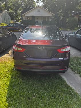 Red 2013 Ford Fusion SE