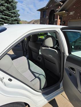 White 2010 Toyota Camry LE