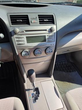 White 2010 Toyota Camry LE