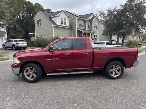 Red 2011 Dodge Ram 1500 SLT