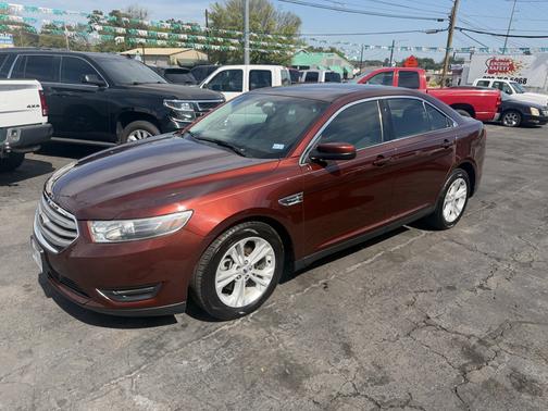 Red 2015 Ford Taurus SEL