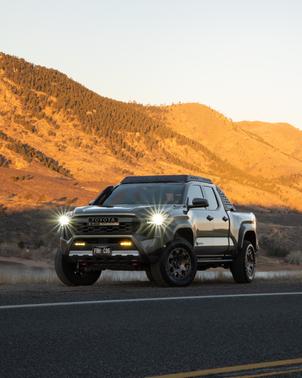 Green 2025 Toyota Tacoma Hybrid Trailhunter