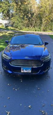 Blue 2014 Ford Fusion Hybrid Titanium