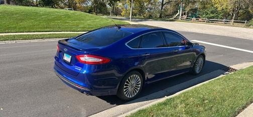 Blue 2014 Ford Fusion Hybrid Titanium