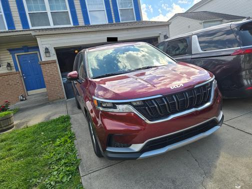 Red 2023 Kia Carnival LX
