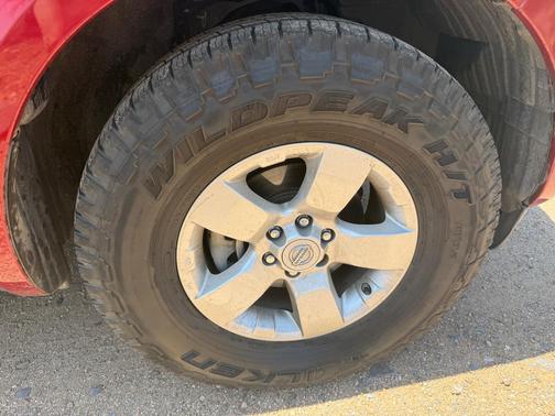 Red 2012 Nissan Frontier SV