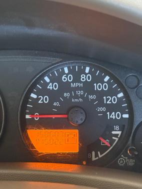 Red 2012 Nissan Frontier SV