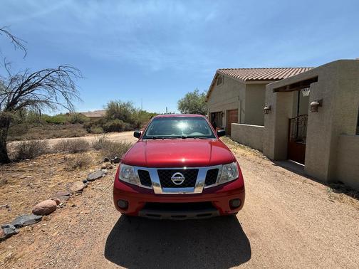 Red 2012 Nissan Frontier SV