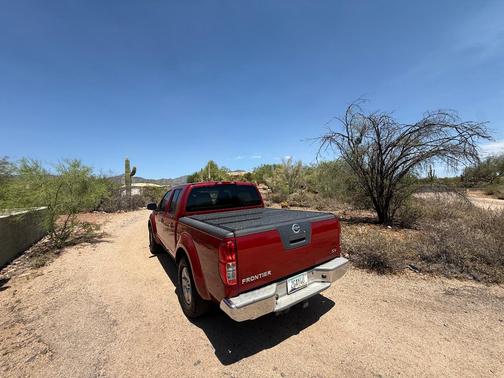 Red 2012 Nissan Frontier SV