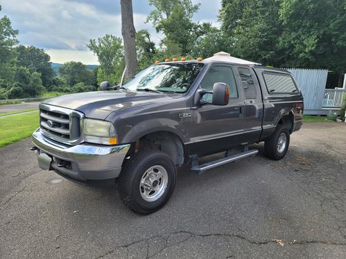 Photo 2 of 11 of 2004 Ford F-250 Lariat SuperCab Super Duty