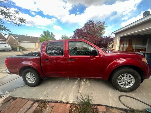 Red 2019 Nissan Frontier SV