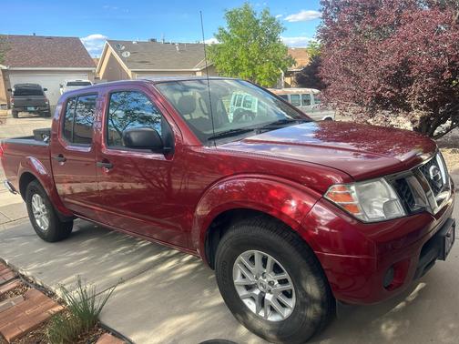 Red 2019 Nissan Frontier SV