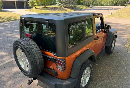 Orange 2011 Jeep Wrangler Sport