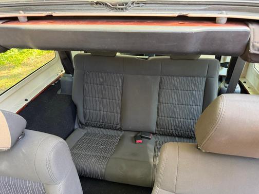 Orange 2011 Jeep Wrangler Sport