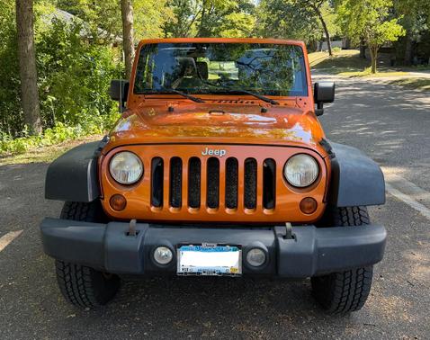Orange 2011 Jeep Wrangler Sport