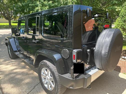 Black 2013 Jeep Wrangler Unlimited Sahara