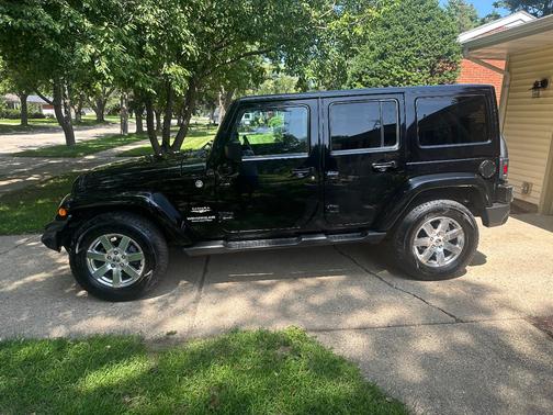 Black 2013 Jeep Wrangler Unlimited Sahara