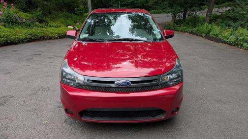 Red 2011 Ford Focus SES
