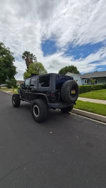 Black 2013 Jeep Wrangler Unlimited Sport
