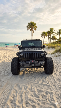 Black 2013 Jeep Wrangler Unlimited Sport