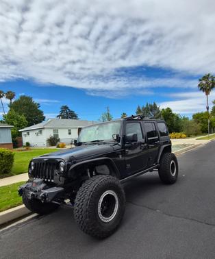 Black 2013 Jeep Wrangler Unlimited Sport