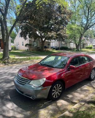 Red 2010 Chrysler Sebring Limited