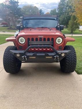 Orange 2009 Jeep Wrangler Unlimited X