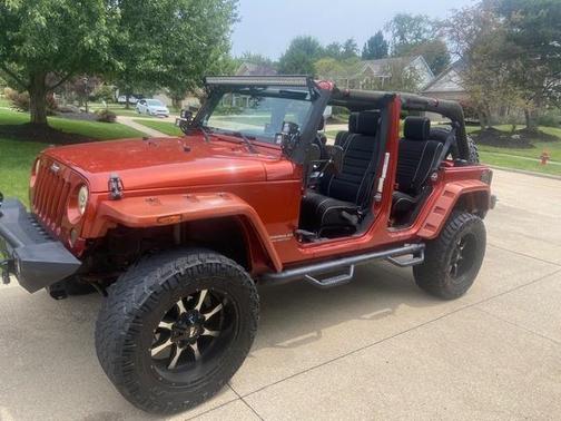 Orange 2009 Jeep Wrangler Unlimited X