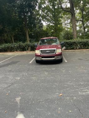 Red 2005 Ford F-150 Lariat SuperCab