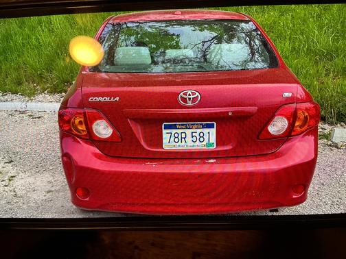 Red 2010 Toyota Corolla LE