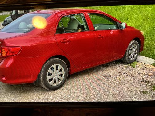 Red 2010 Toyota Corolla LE